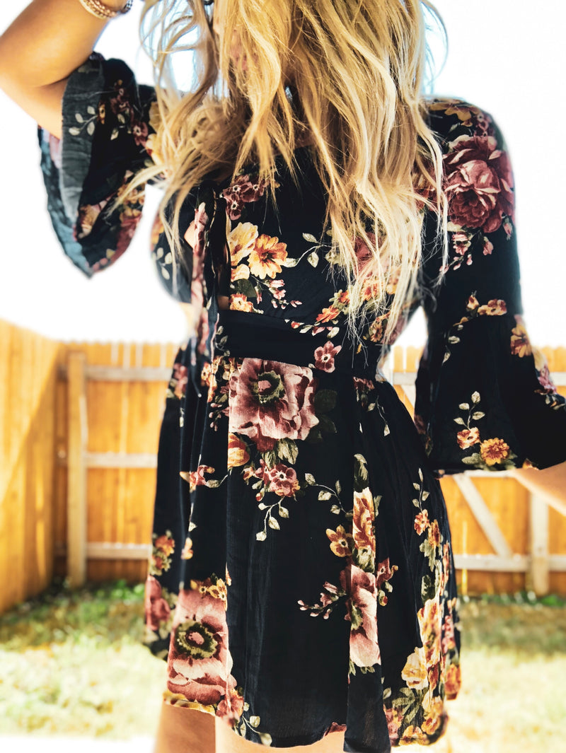 Floral romper with knot tie