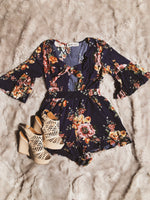 Floral romper with knot tie